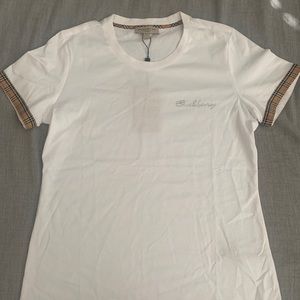 Super cute white bling bushberry/burberry shirt